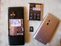 Sony Ericsson Elm J10i mobiltelefon + ajándék